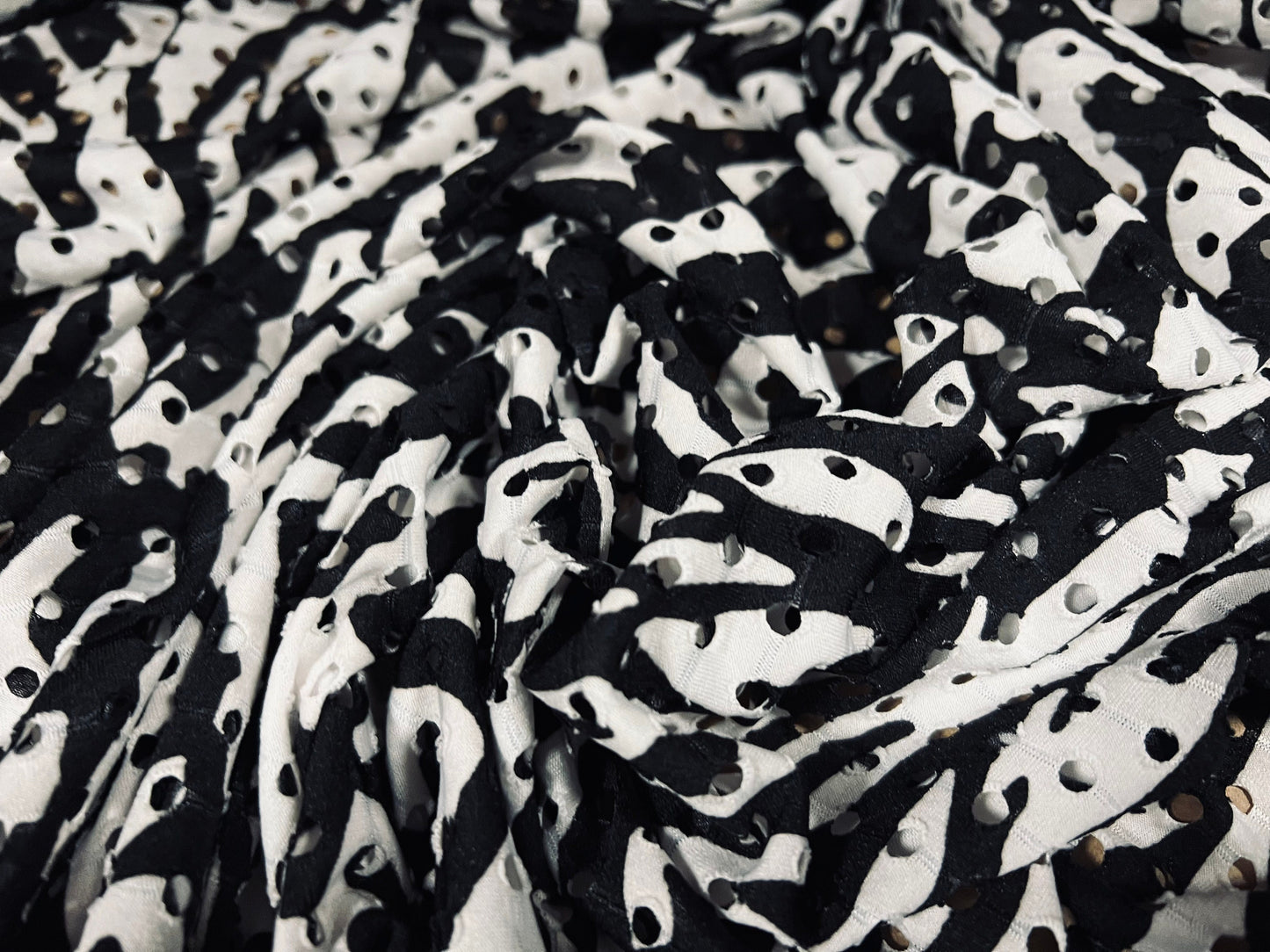 Eyelet stretch spandex single jersey laser cut fabric, per metre - distressed zebra print - black & white