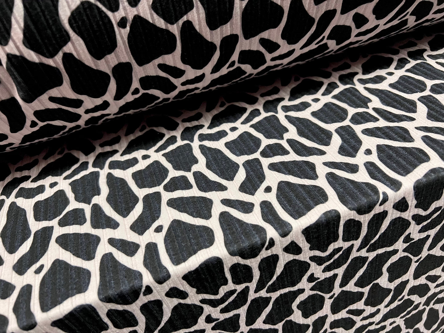 Spandex rib stretch jersey fabric, per metre - giraffe animal print - black & oyster