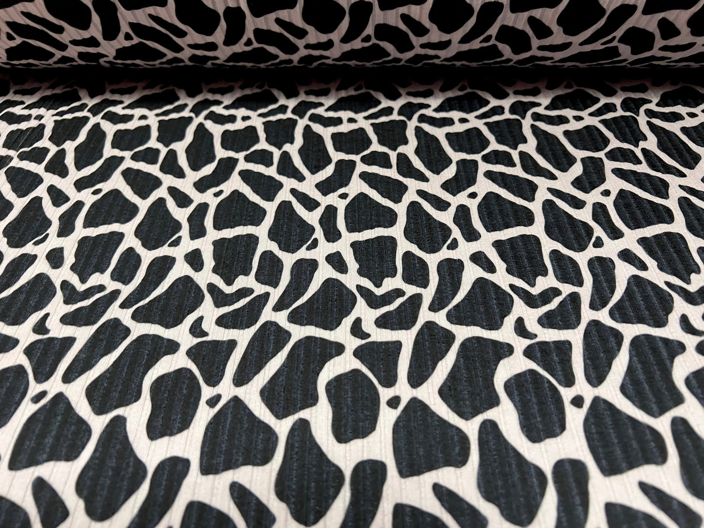 Spandex rib stretch jersey fabric, per metre - giraffe animal print - black & oyster