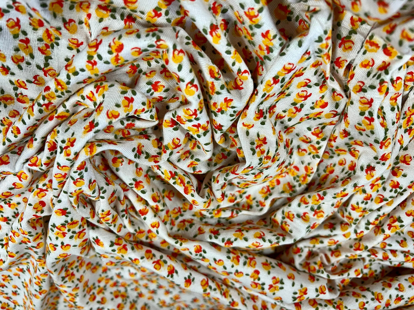 Viscose spandex stretch jersey fabric, per metre - small ditsy flower print - white & orange
