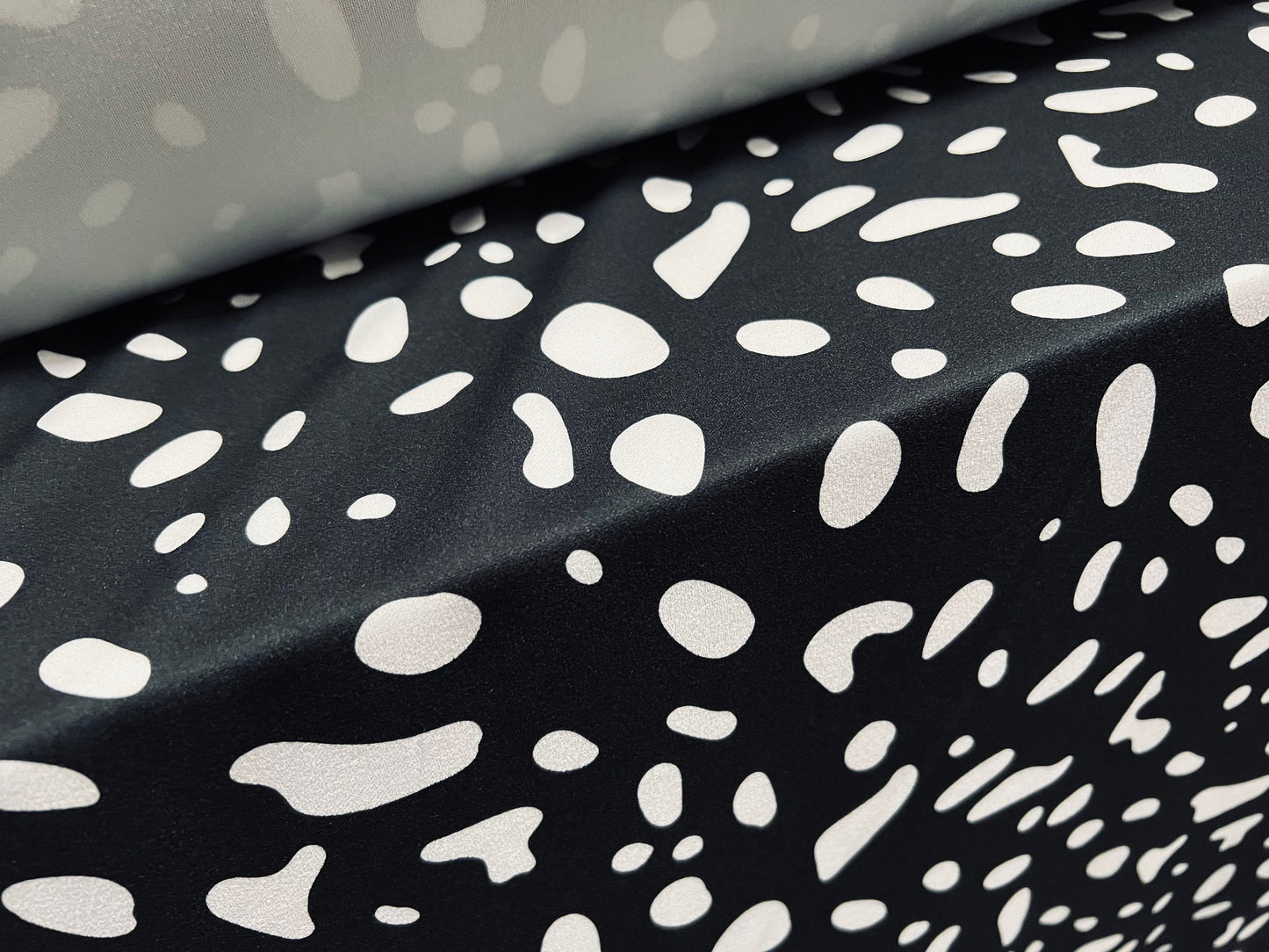 Scuba crepe stretch spandex jersey dress fabric, per metre - puddle print - black & white
