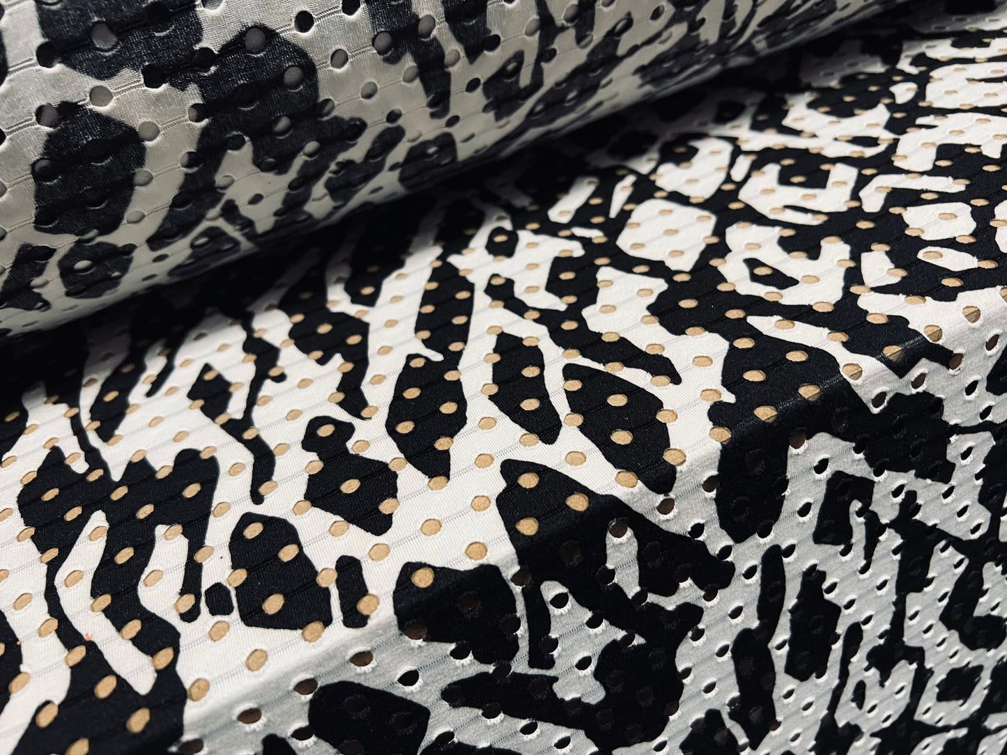 Eyelet stretch spandex single jersey laser cut fabric, per metre - distressed zebra print - black & white