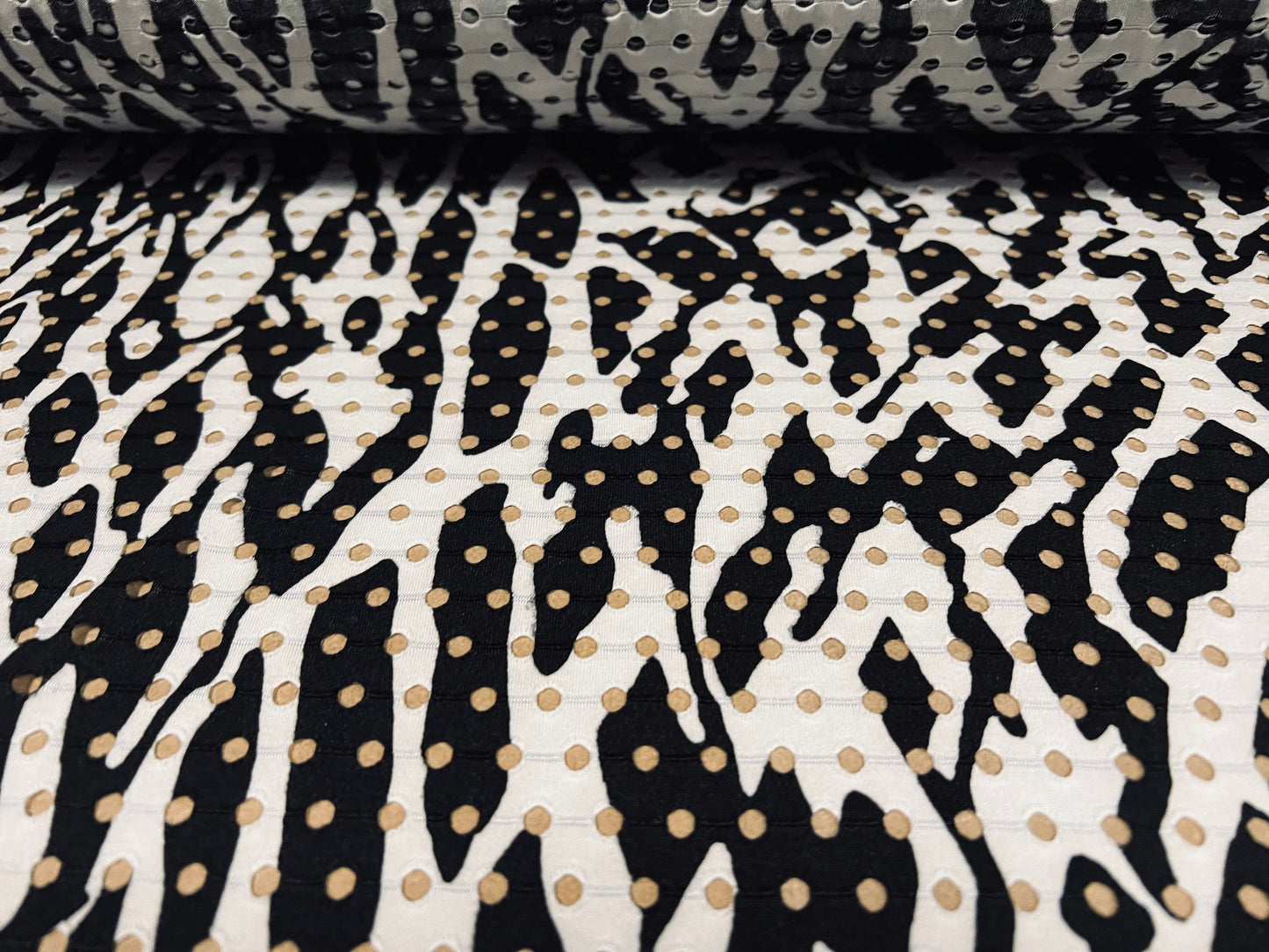 Eyelet stretch spandex single jersey laser cut fabric, per metre - distressed zebra print - black & white