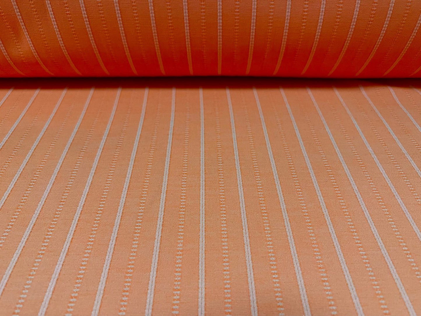 Woven stretch spandex raised pinstripe in a stripe fabric, per metre - orange