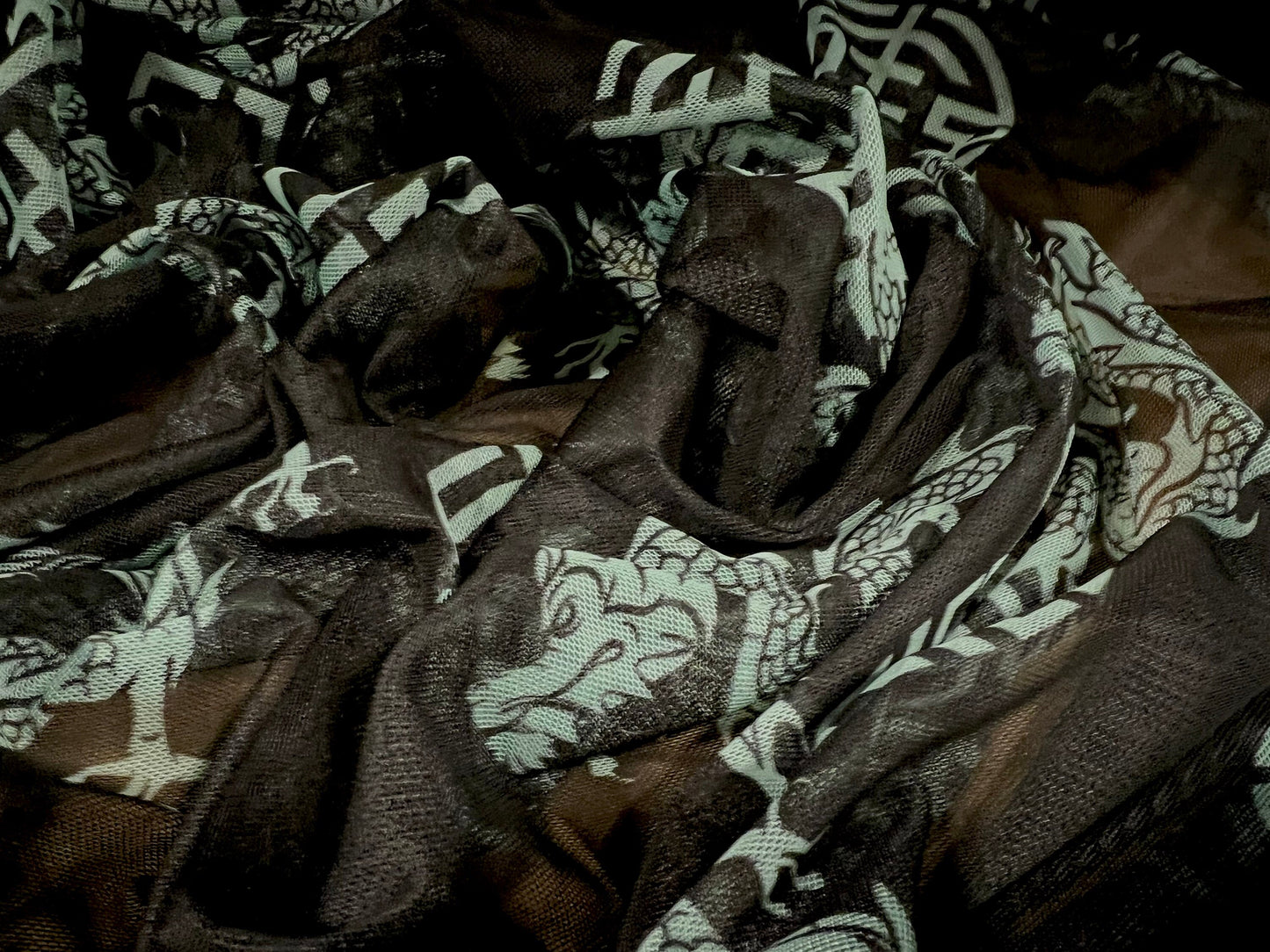 Power mesh net stretch spandex fabric, per metre - maze and dragons print - black & mint green