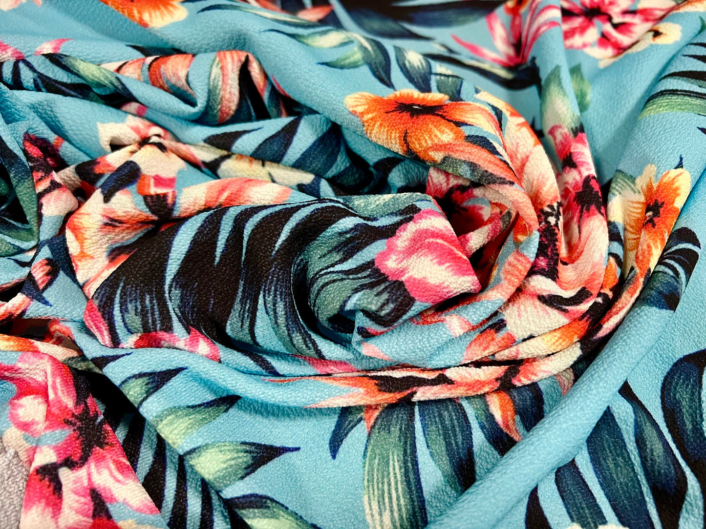Bubble crepe woven dress fabric with comfort stretch - tropical flower print - turquoise