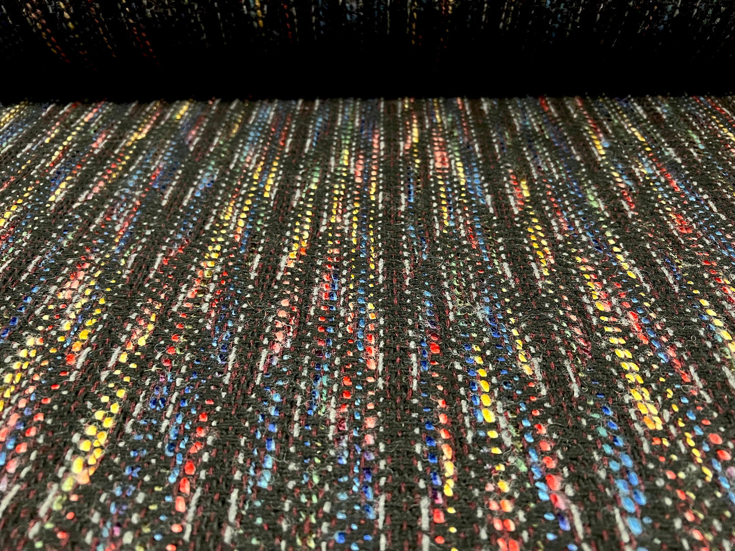 Wool blend bouclé fabric, per metre - black with multicolour slub design