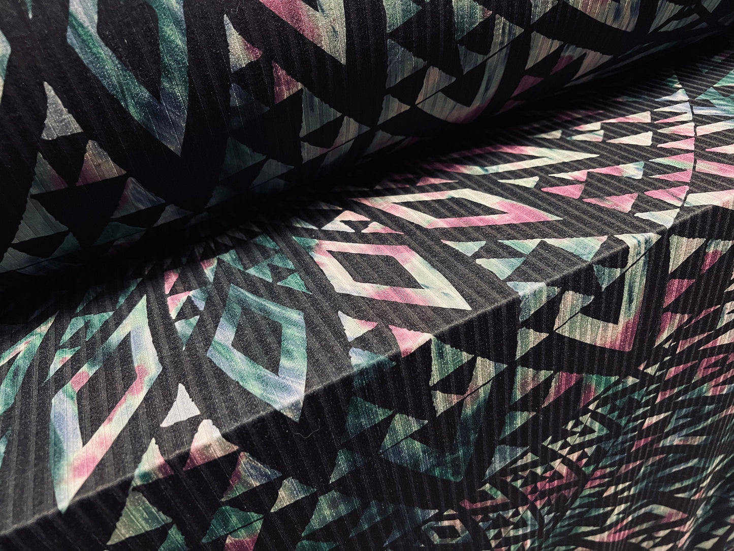 Spandex stretch rib jersey fabric, per metre - geometric tribal swirl print - dark emerald, black & pink