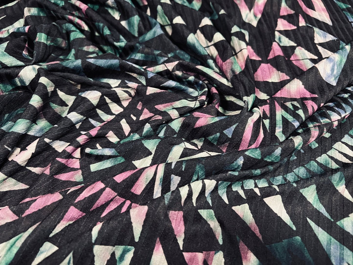 Spandex stretch rib jersey fabric, per metre - geometric tribal swirl print - dark emerald, black & pink