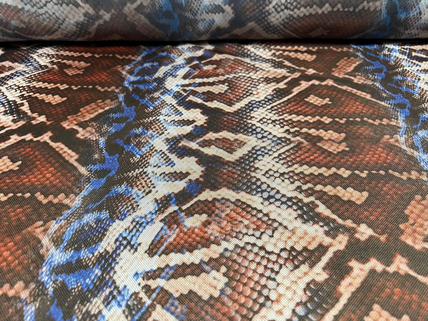 Power mesh net stretch spandex fabric, per metre - snakeskin print - brown & cobalt blue