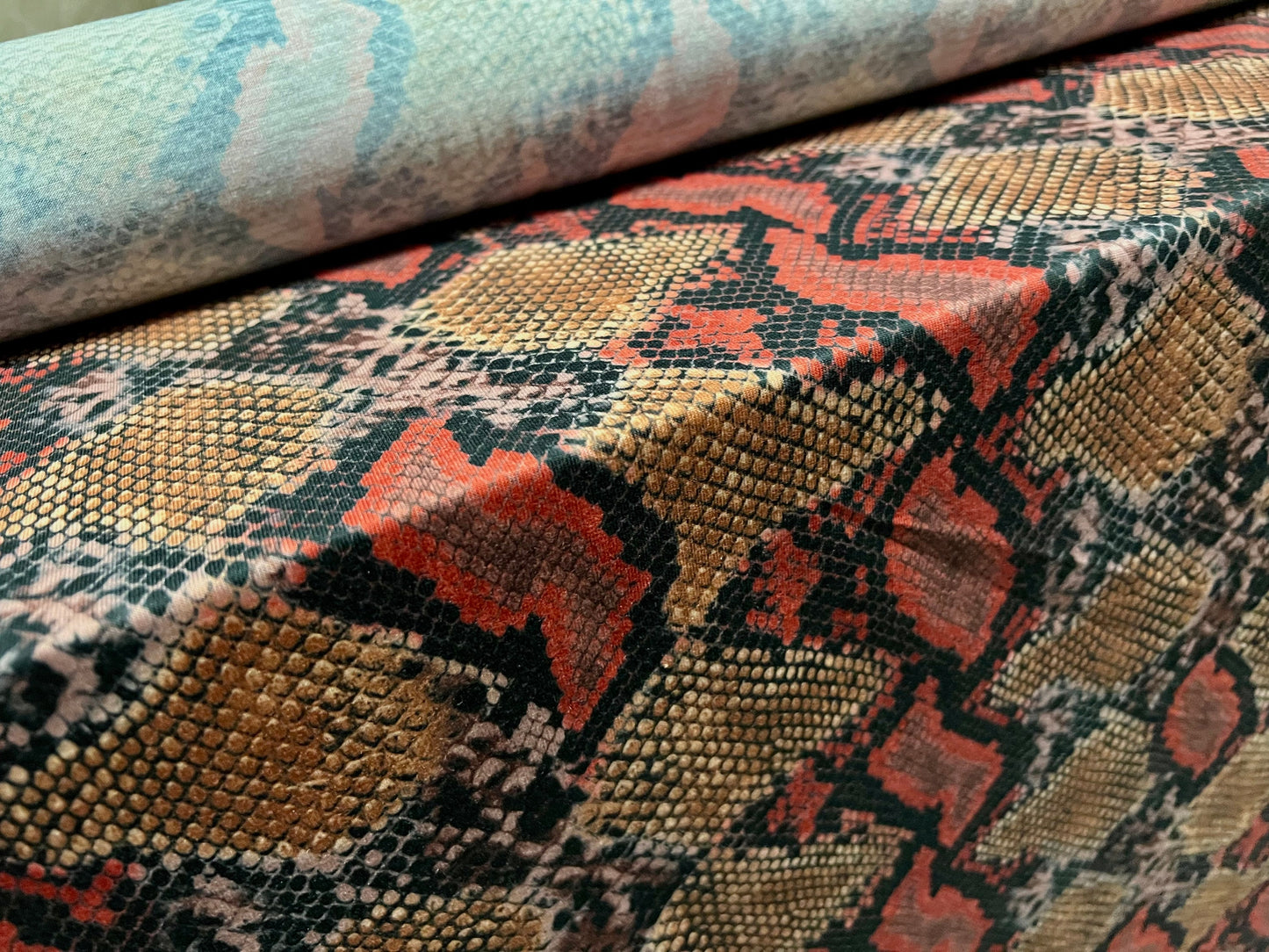 Soft handle stretch spandex single jersey fabric, per metre - snakeskin animal print - orange & red