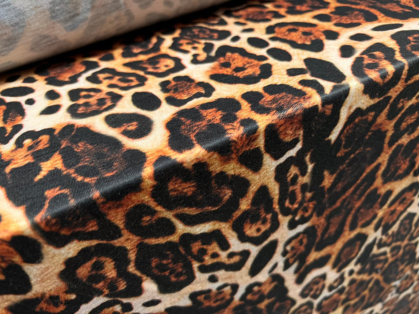 Soft handle single jersey fabric, per metre - Jaguar animal print - gold & brown