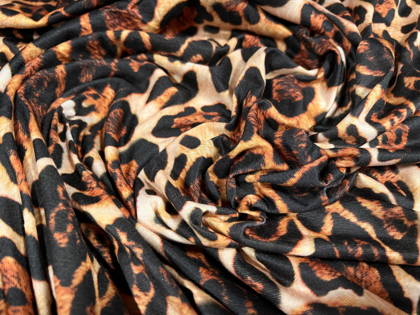Soft handle single jersey fabric, per metre - Jaguar animal print - gold & brown