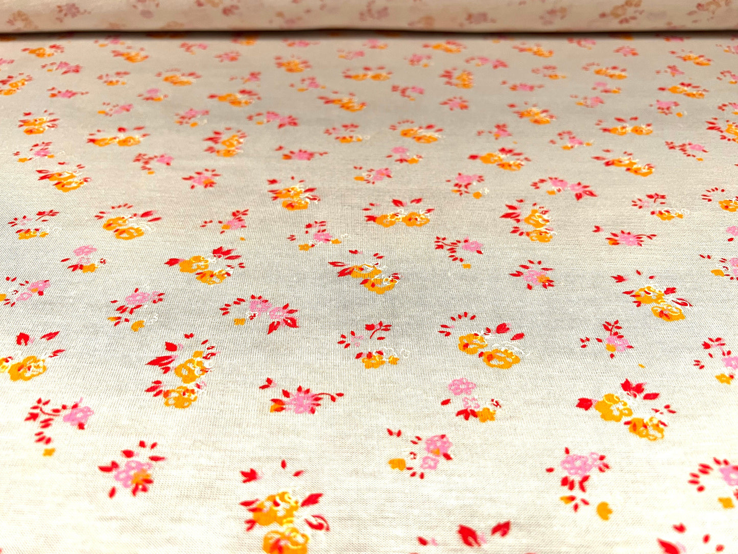 Viscose spandex stretch single jersey fabric, per metre - Ditsy flower print - Cream & orange