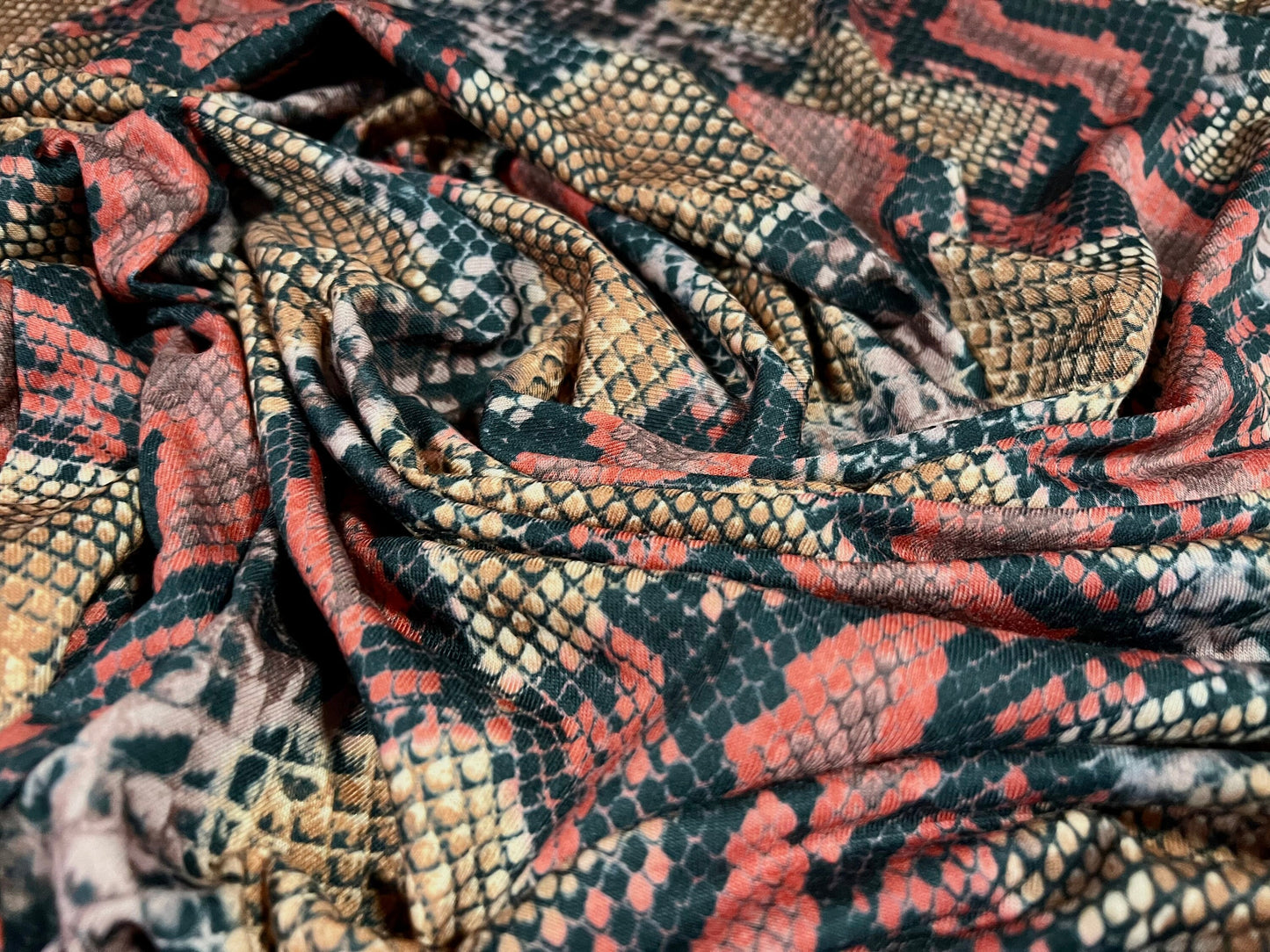Soft handle stretch spandex single jersey fabric, per metre - snakeskin animal print - orange & red