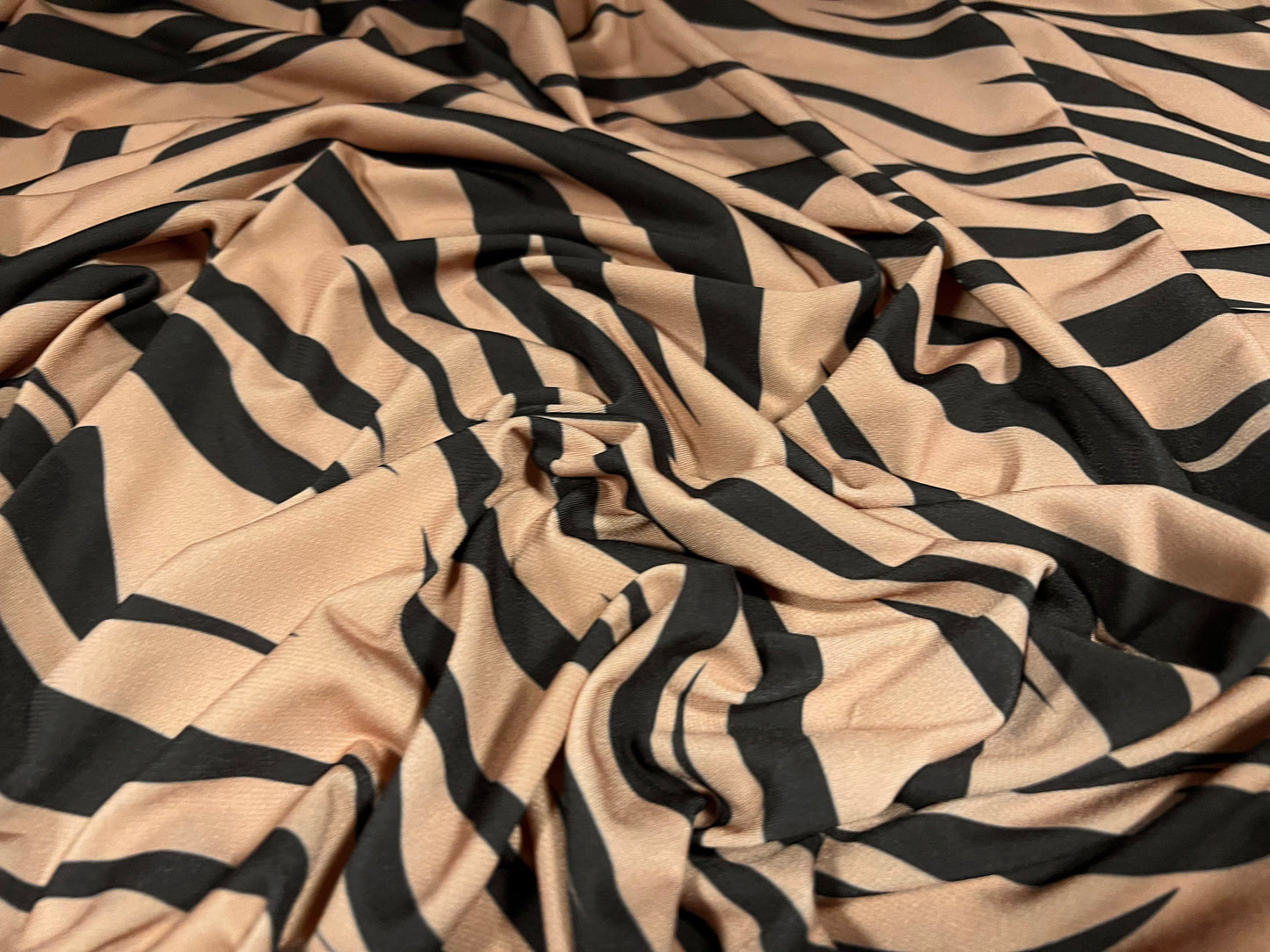 Stretch spandex crepe jersey fabric, per metre - Stylised zebra print - lazy brown