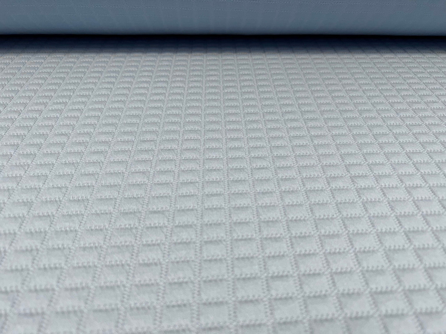 Mock quilted double jersey spandex fabric, per metre - geometric squares design - baby blue