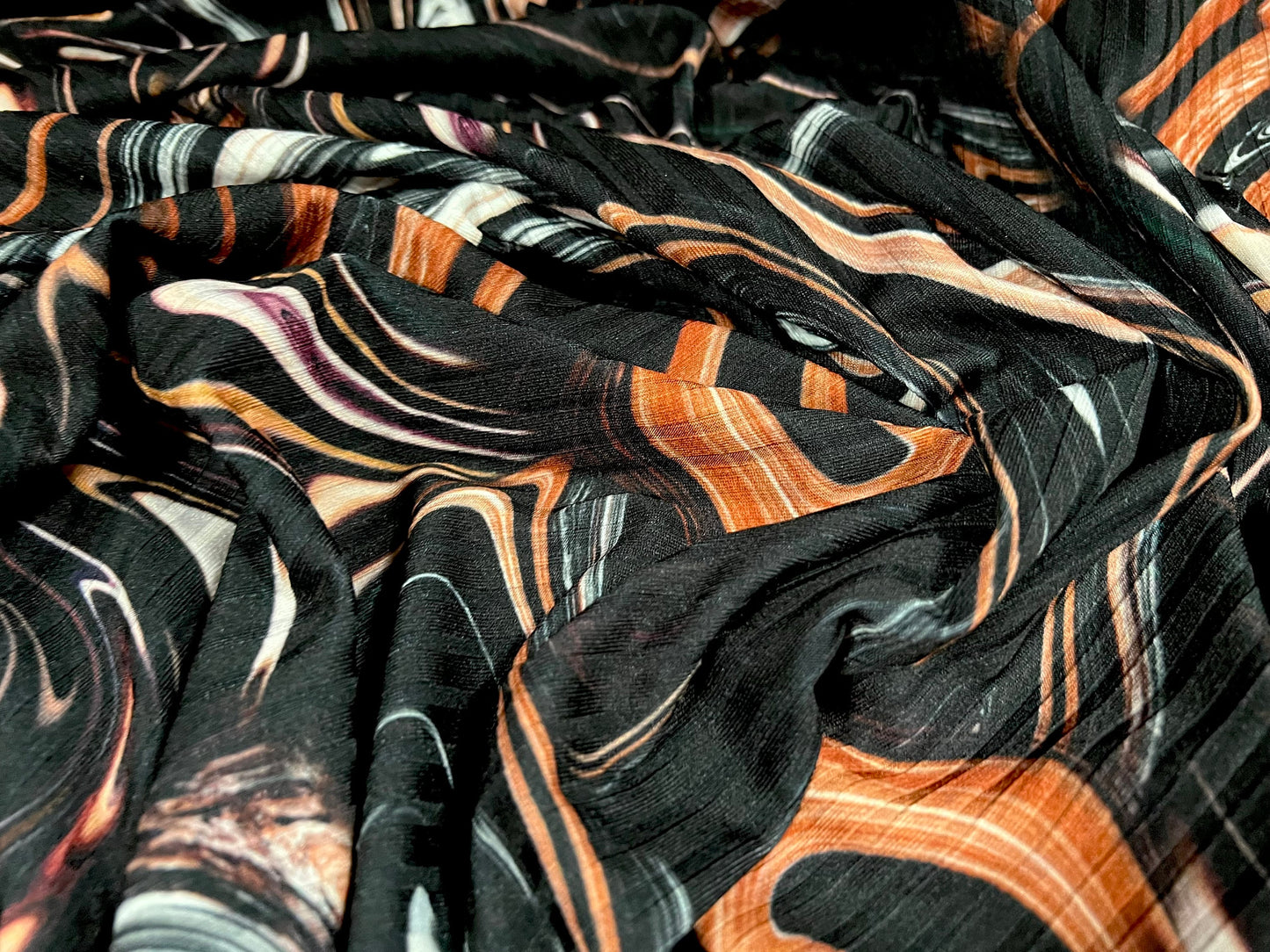 Stretch spandex rib jersey fabric, per metre - swirl print - black & terracotta