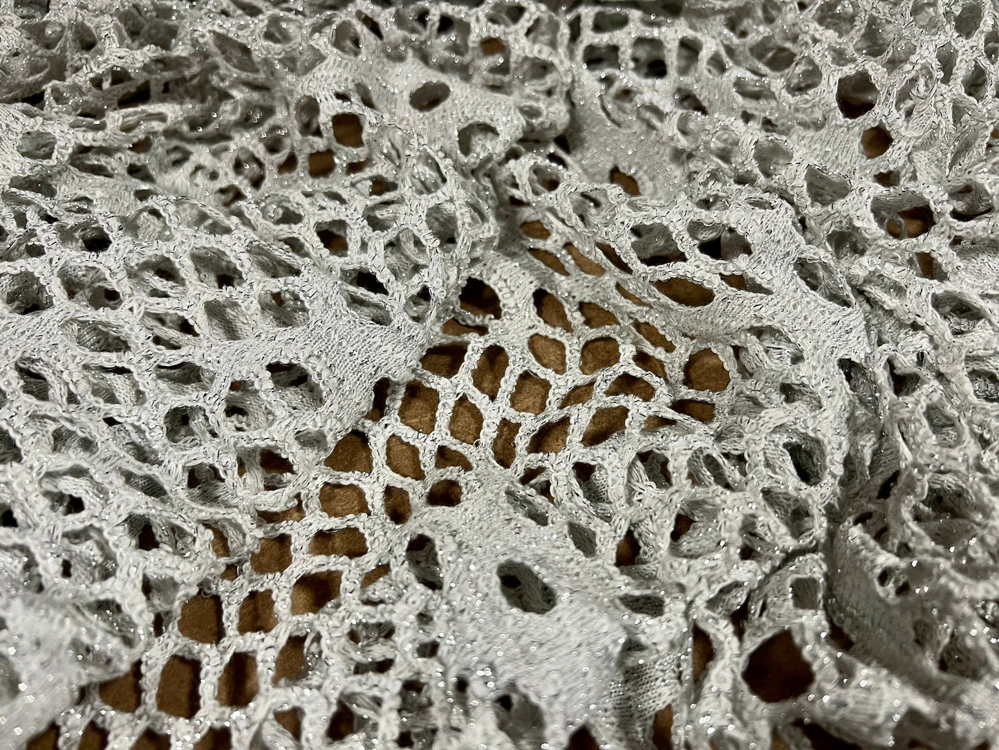 Metallic crochet knitwear jersey fabric, per metre - silver lurex