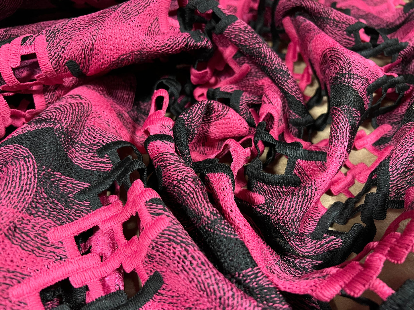 Couture dress fabric, per metre - chain link swirl embroidery - black & pink