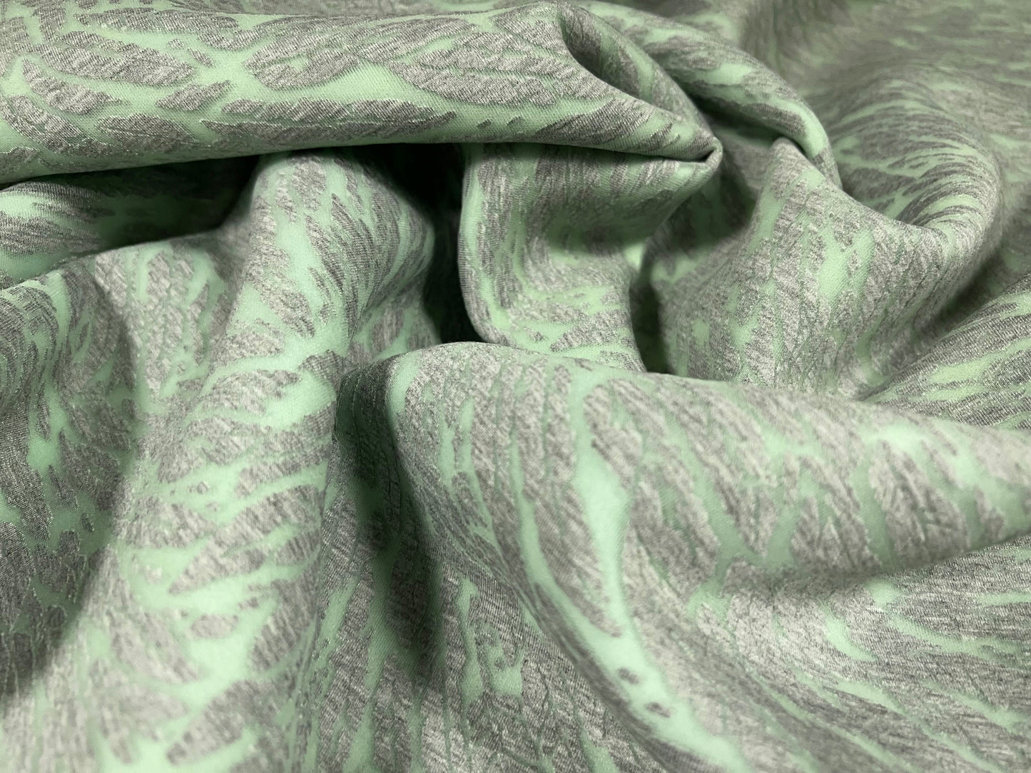 Couture fabric, per metre - bonded scuba stretch jersey with flocked animal print - aqua & grey