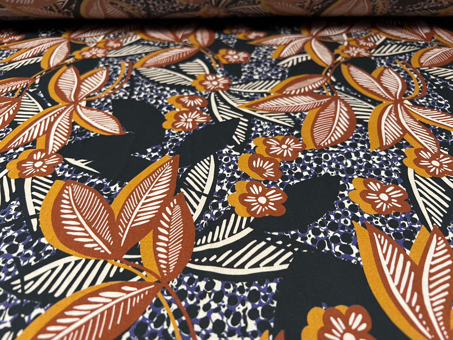 Cotton lawn woven dress fabric, per metre - floral print - black & terracotta
