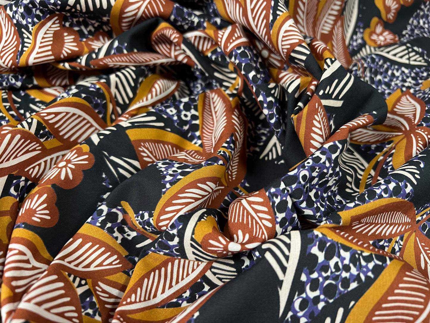Cotton lawn woven dress fabric, per metre - floral print - black & terracotta