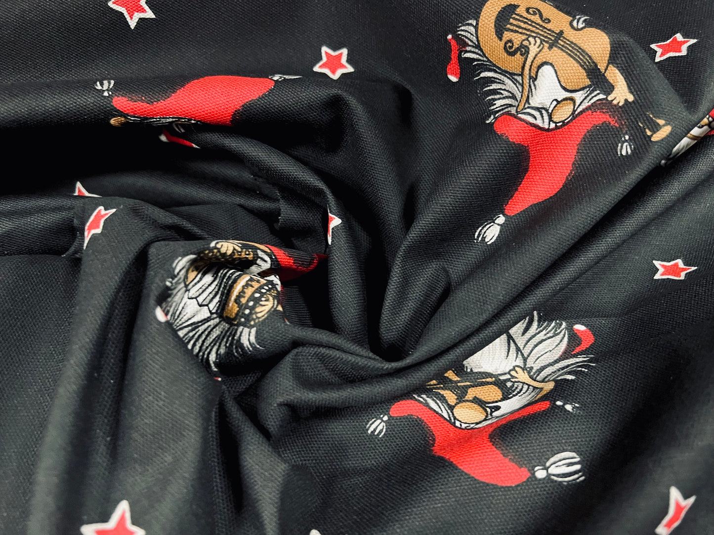 Woven cotton fabric, per metre - musical elves and stars cartoon print - black & red