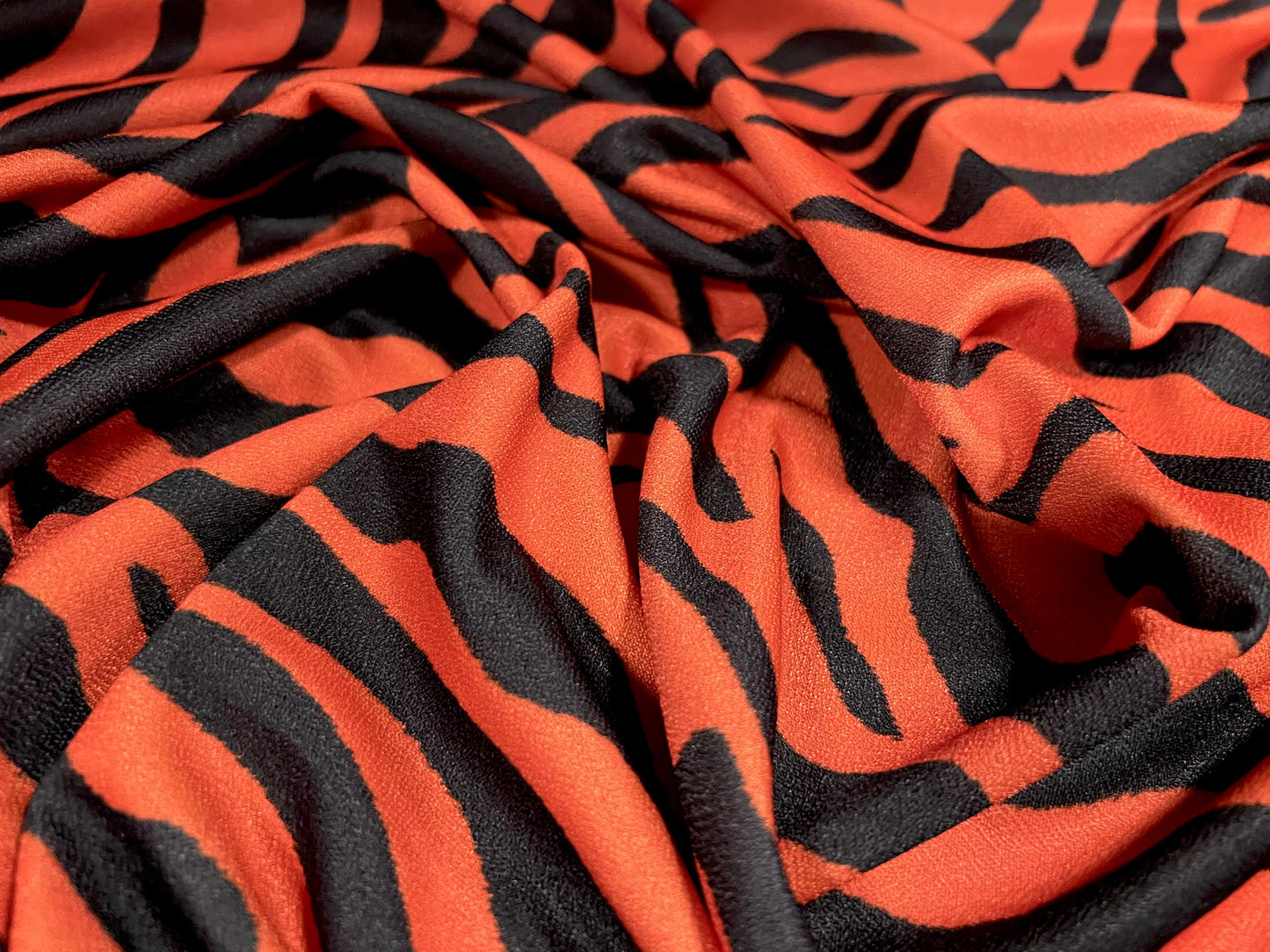 Valentino crepe spandex jersey fabric - similar to scuba - per metre - zebra print - burnt orange
