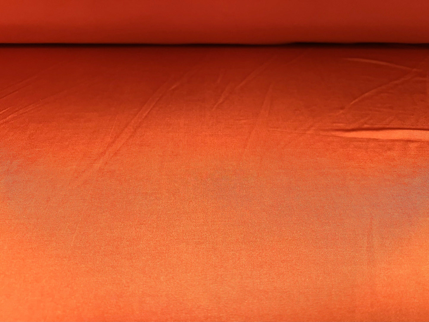 Disco shimmer Spandex stretch single jersey fabric, per metre - plain - burnt Orange