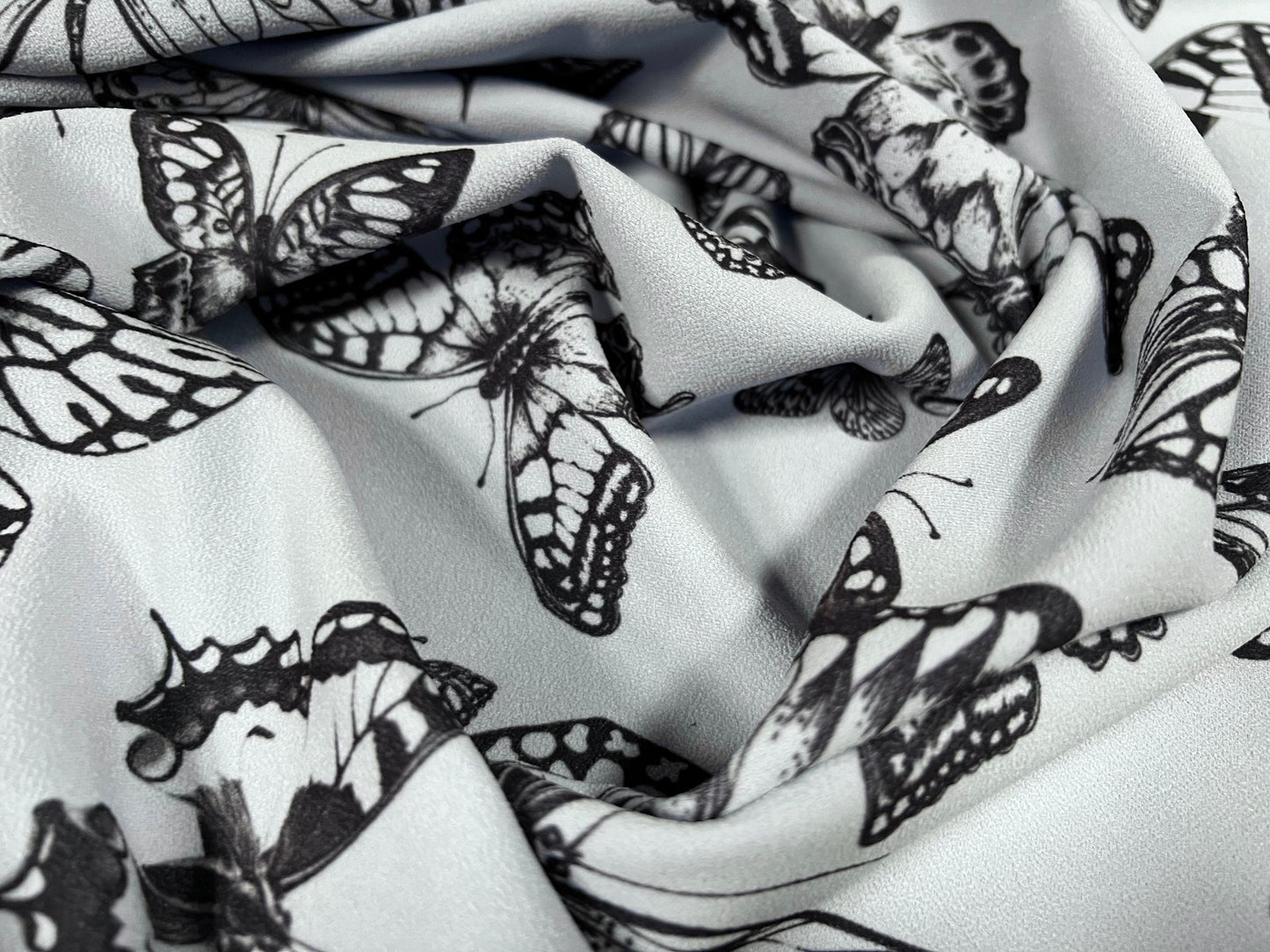 Scuba crepe stretch spandex jersey fashion fabric, per metre - butterflies print - pale blue