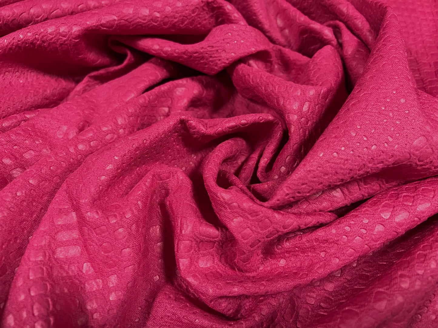Scuba stretch spandex double jersey fabric, per metre - embossed crocodile design - fuchsia pink