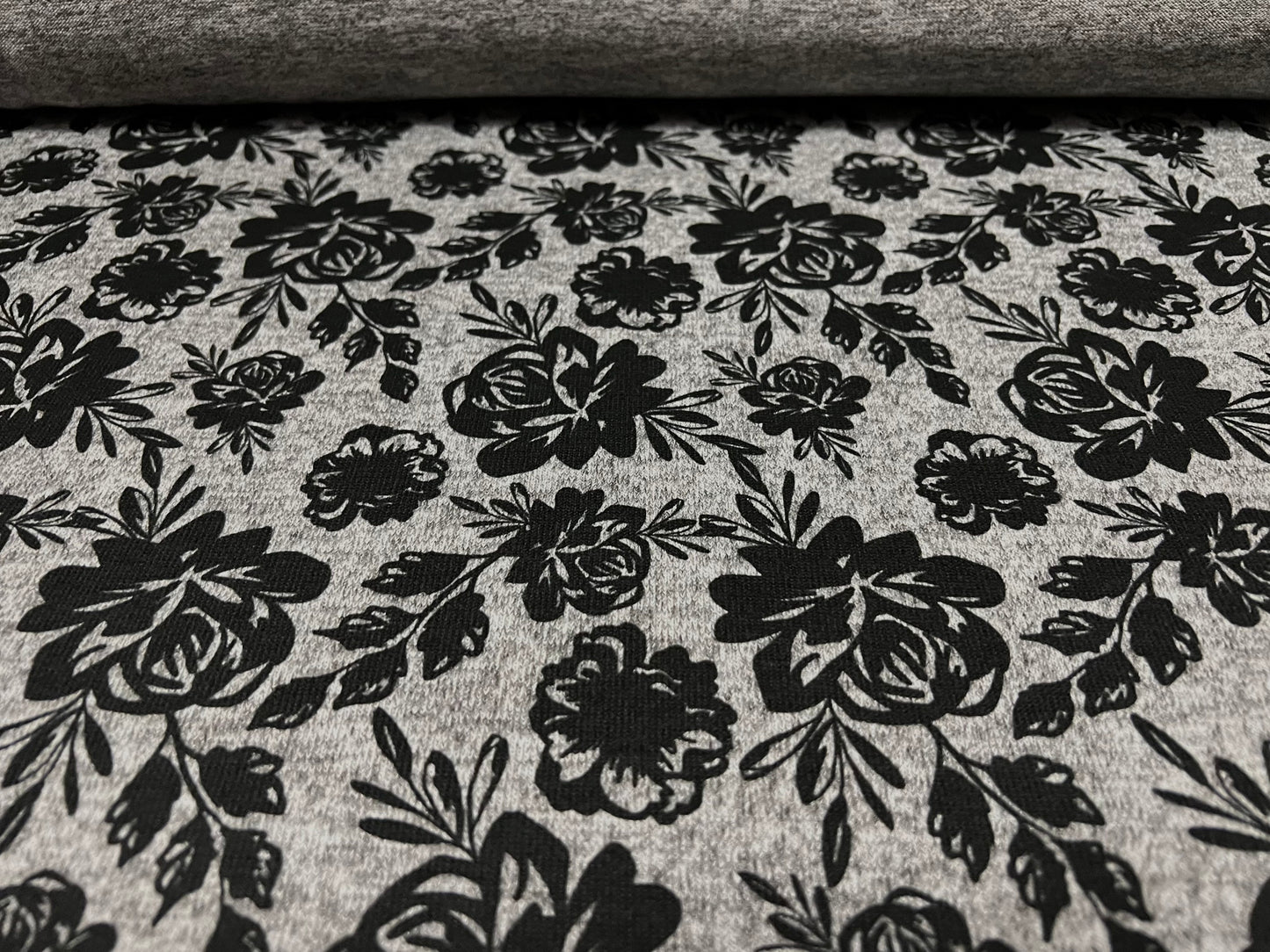 Super soft knitwear jersey fabric, per metre - floral print - grey marl with black rose