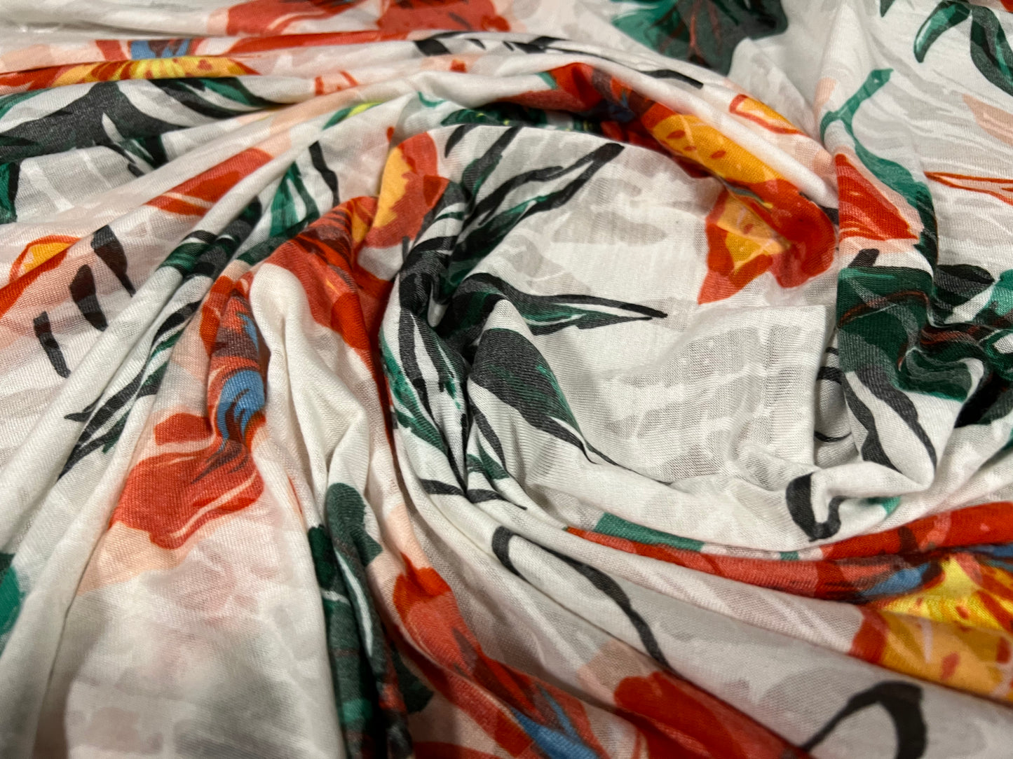 Lady K lightweight burnout single jersey fabric, per metre - lily flower print - ivory & orange