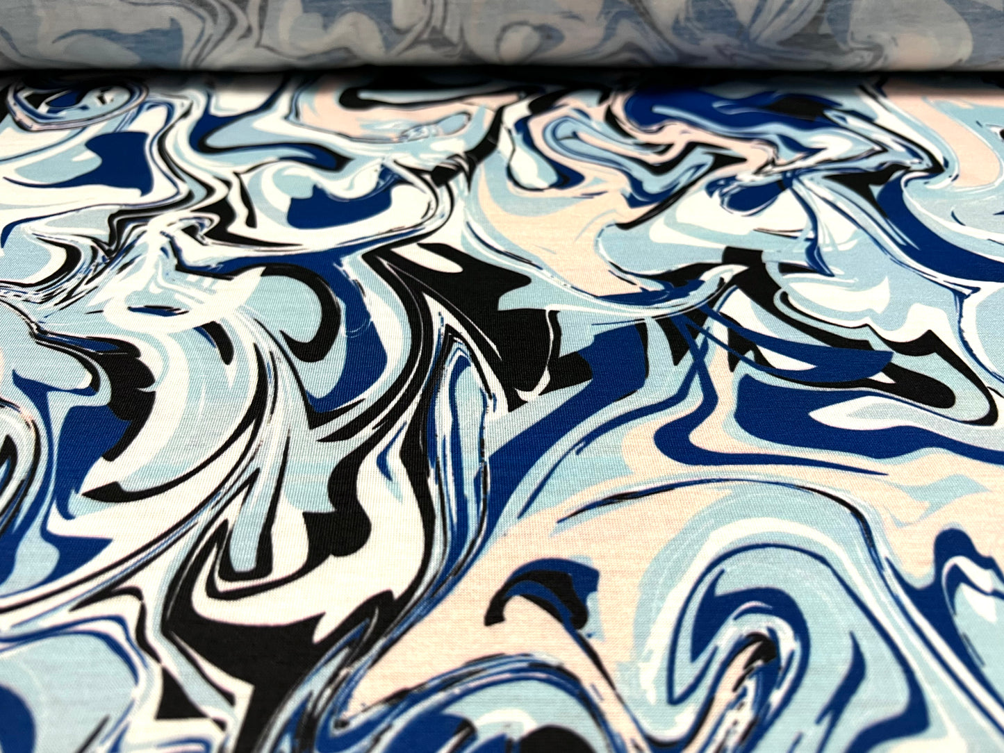 Soft handle single jersey dress fabric, per metre - swirl print - blue