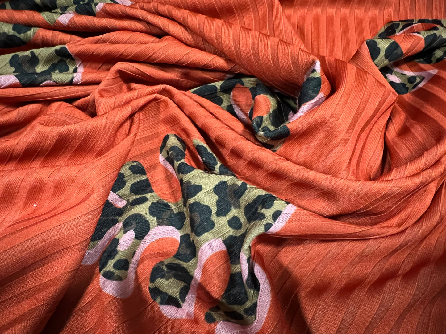 Spandex rib stretch jersey fabric, per metre - safari leaf print - burnt orange