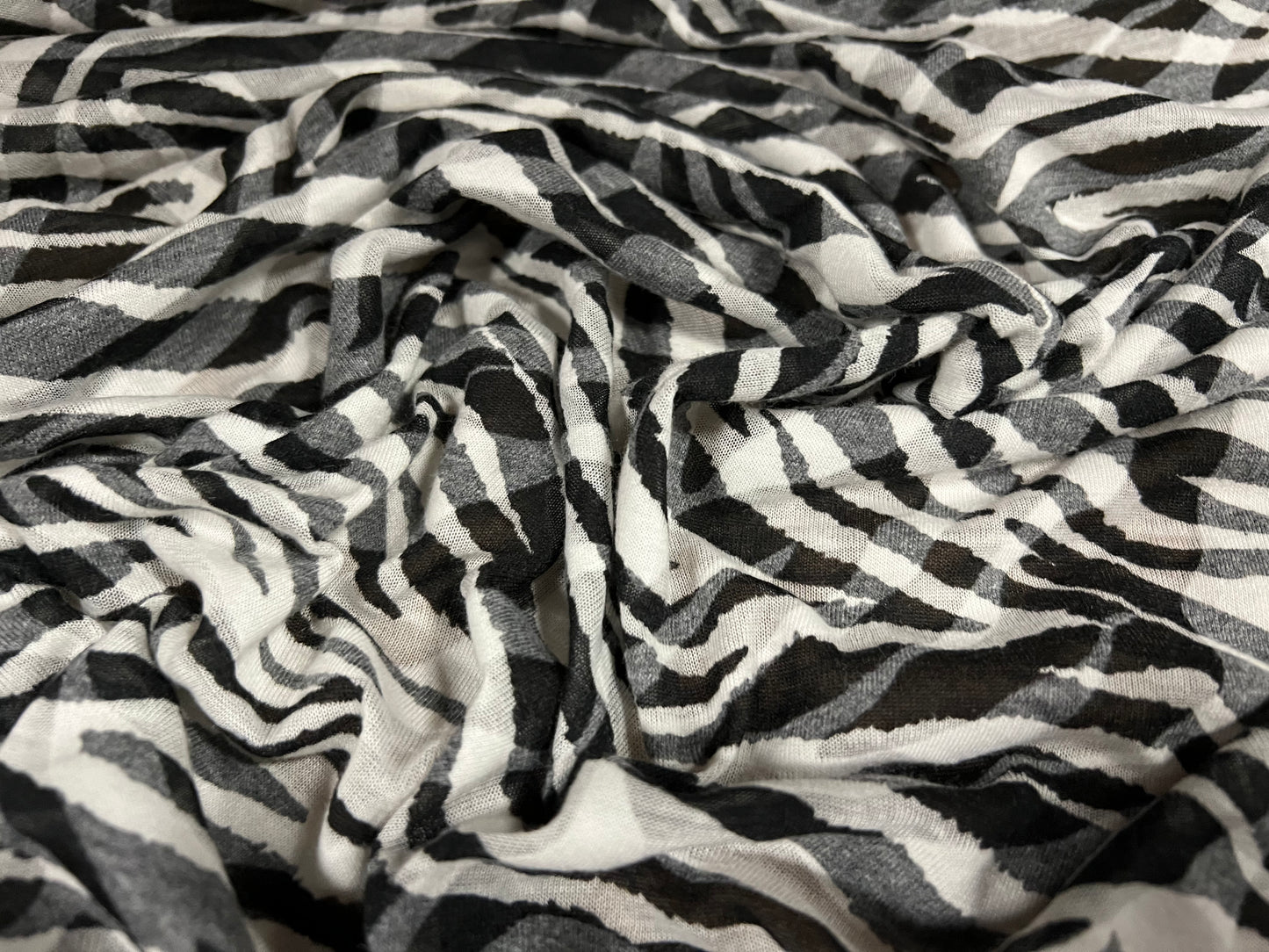 Lady K lightweight burnout single jersey fabric, per metre - stylised zebra print - black & white