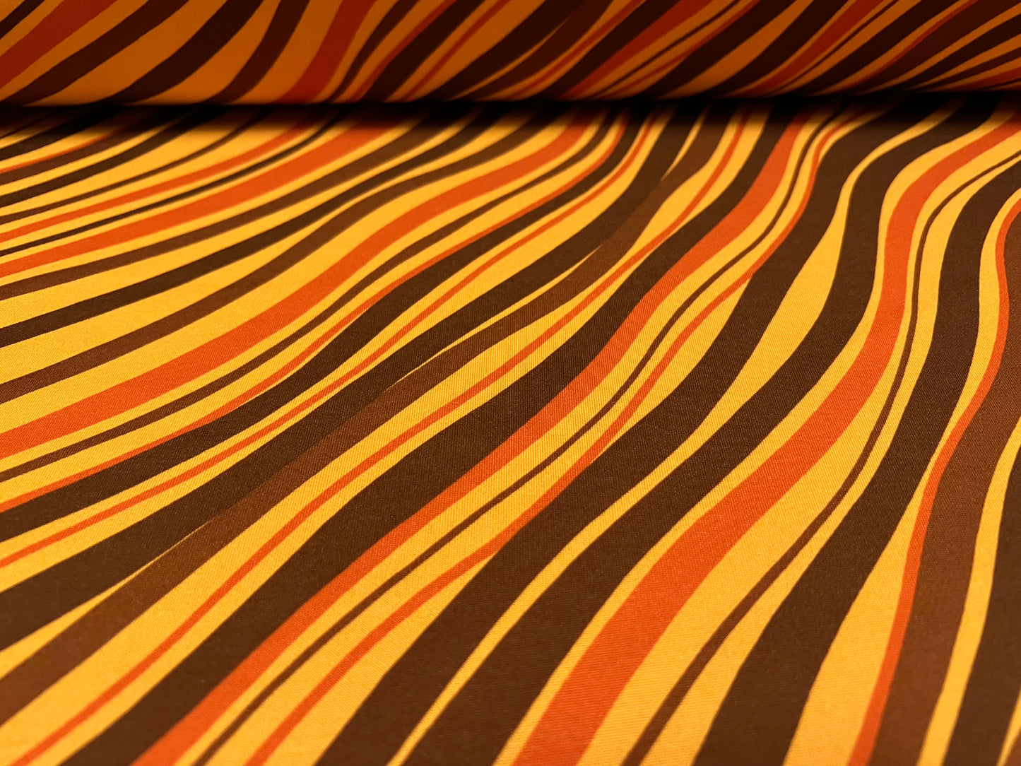 Scuba neoprene style double jersey stretch spandex fabric, per metre - wave print - amber orange & brown