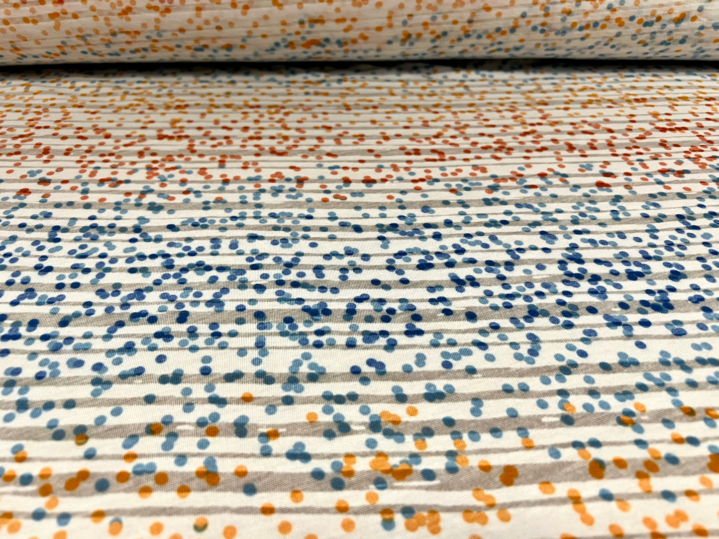 Lady K lightweight burnout single jersey fabric, per metre - ombré spots print - orange & blue