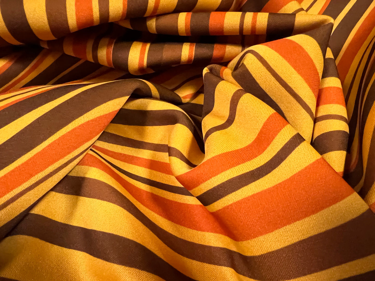 Scuba neoprene style double jersey stretch spandex fabric, per metre - wave print - amber orange & brown