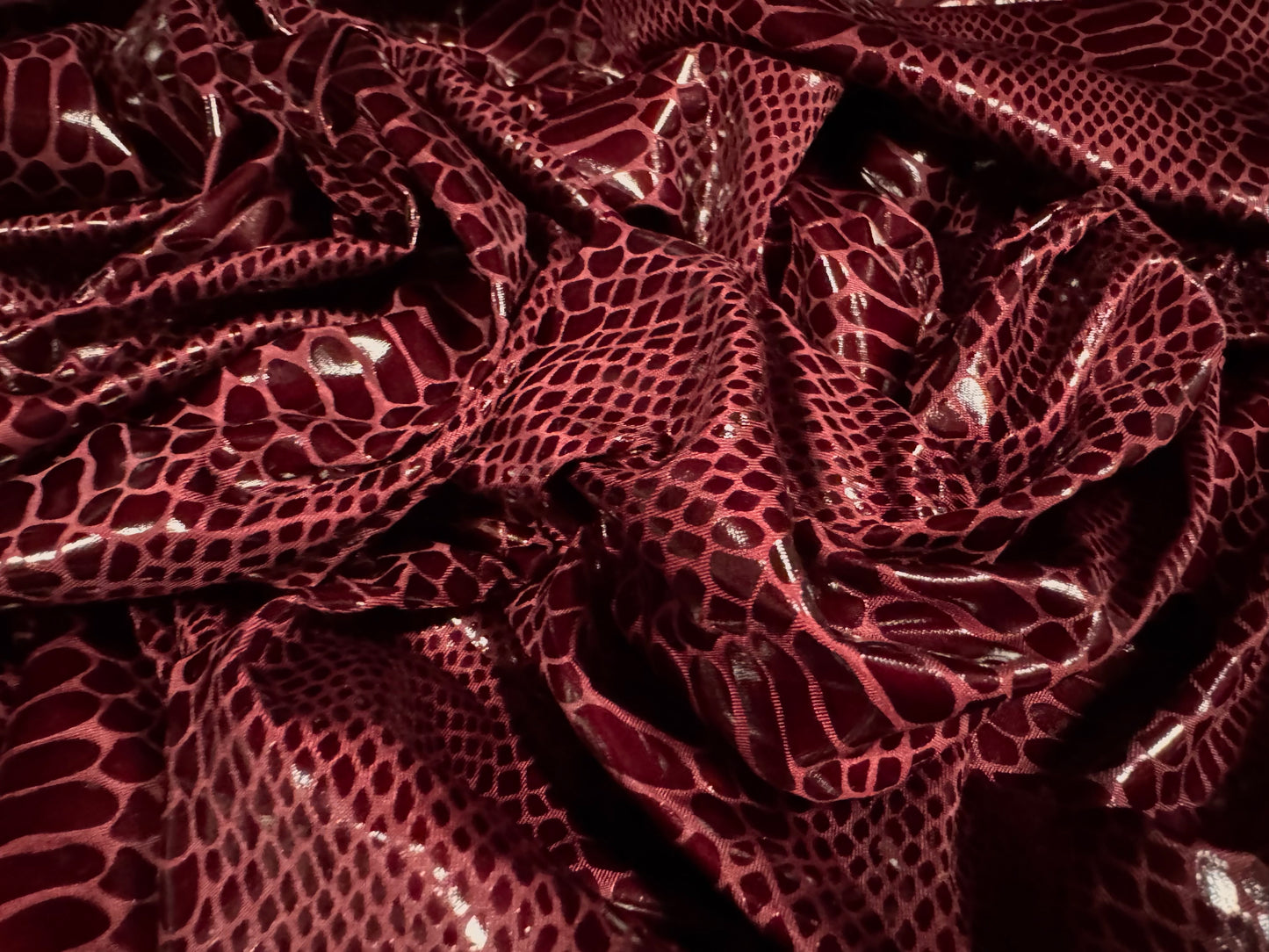 Embossed faux leather p.u. coated jersey fabric, per metre - snakeskin - burgundy