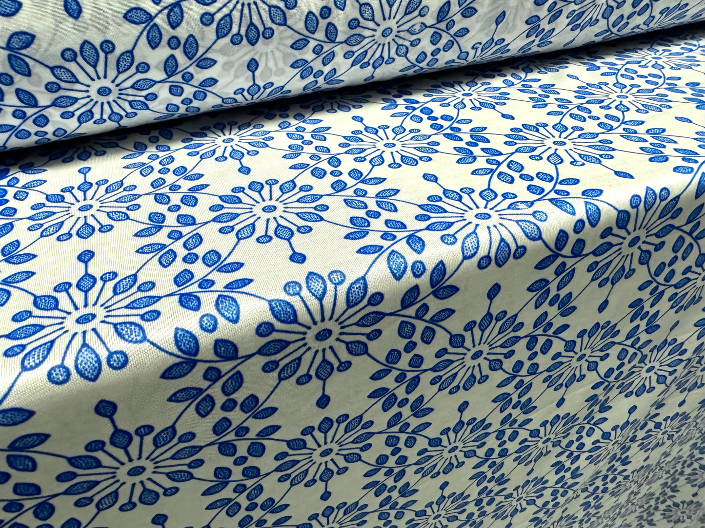 Angelique lightweight sateen jersey fabric, per metre - stylised flower print - white & cobalt blue