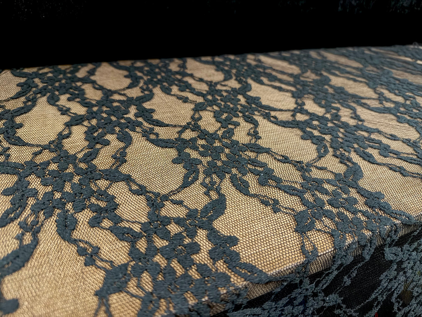Floral lace fabric with decorative borders, per metre - black