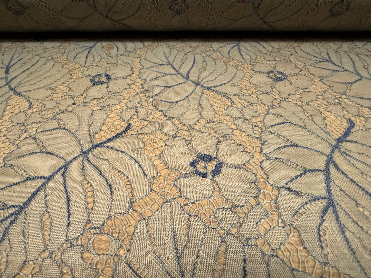 Fine lace fabric, per metre - leaf design - stone & navy