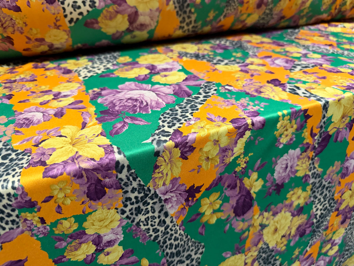 Single jersey fashion fabric, per metre - flowers & animal print - green orange & purple