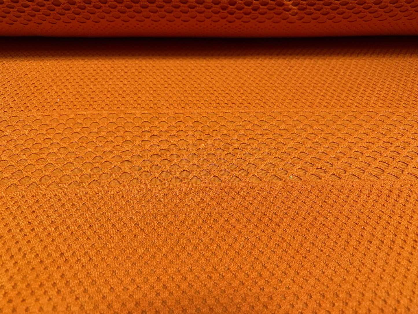 Bonded fishnet stretch spandex jersey fabric, per metre - orange on orange