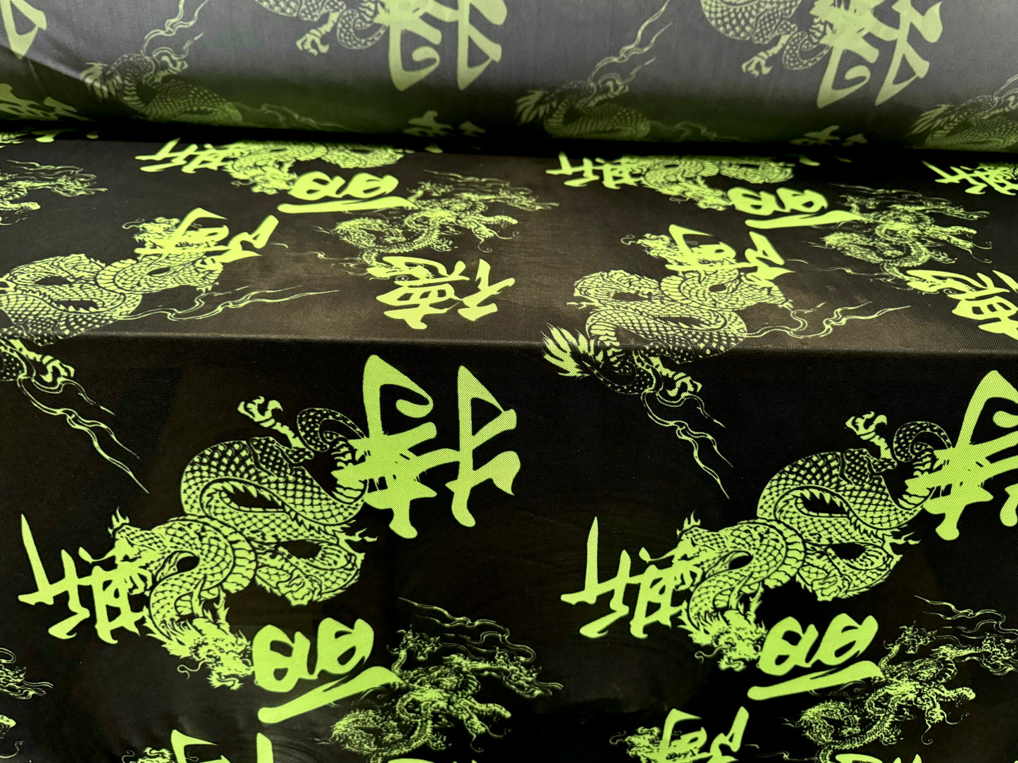 Power mesh net stretch spandex fabric, per metre - Year of the Dragon - black & green