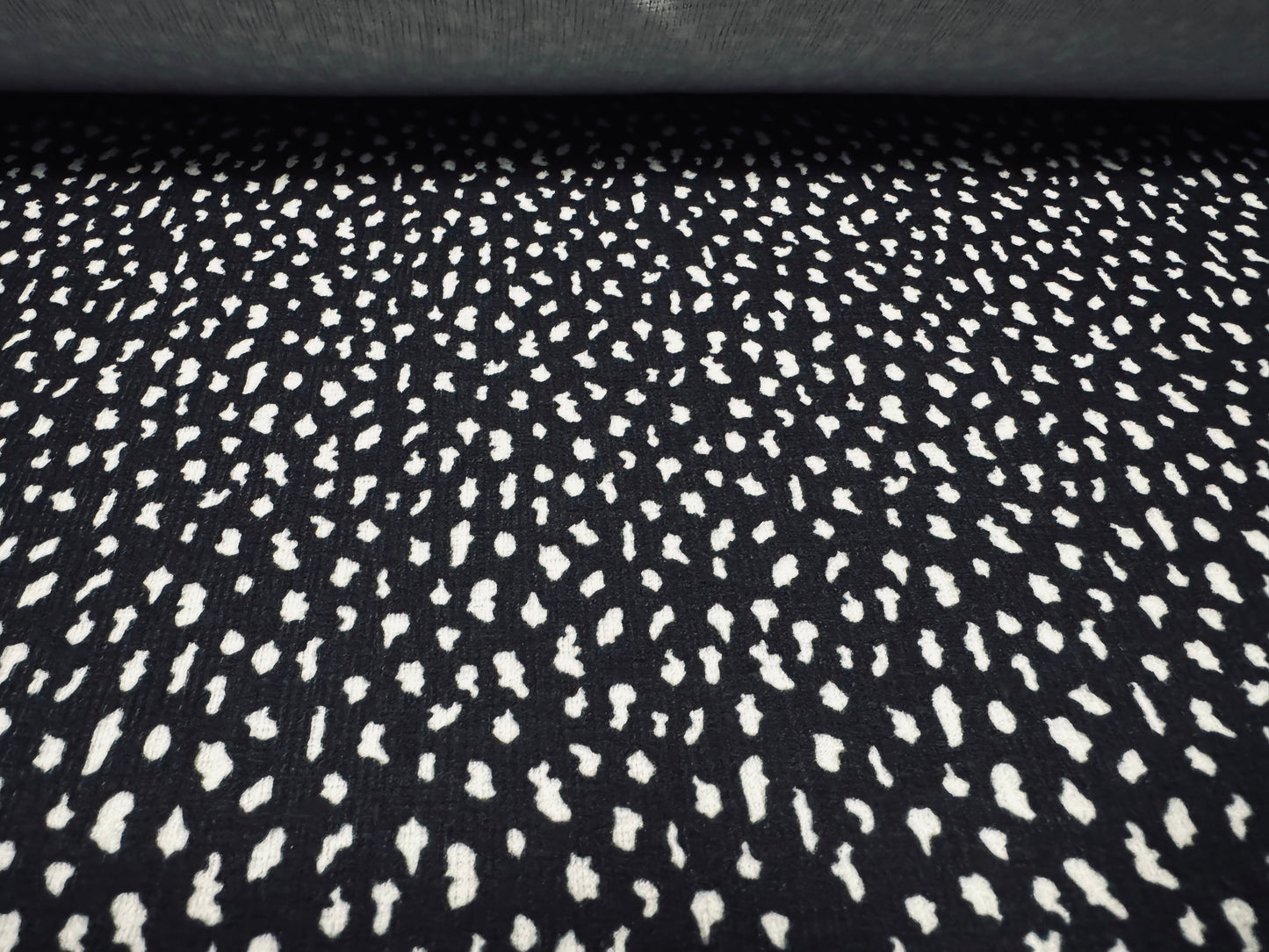 Straw cloth textured stretch double jersey fabric, per metre - asteroid print - black & white