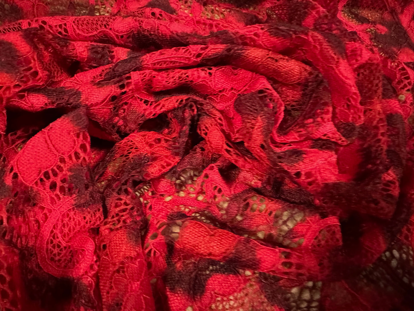 Stretch lace dress fabric with scalloped selvedge, per metre - leopard animal print - red & black