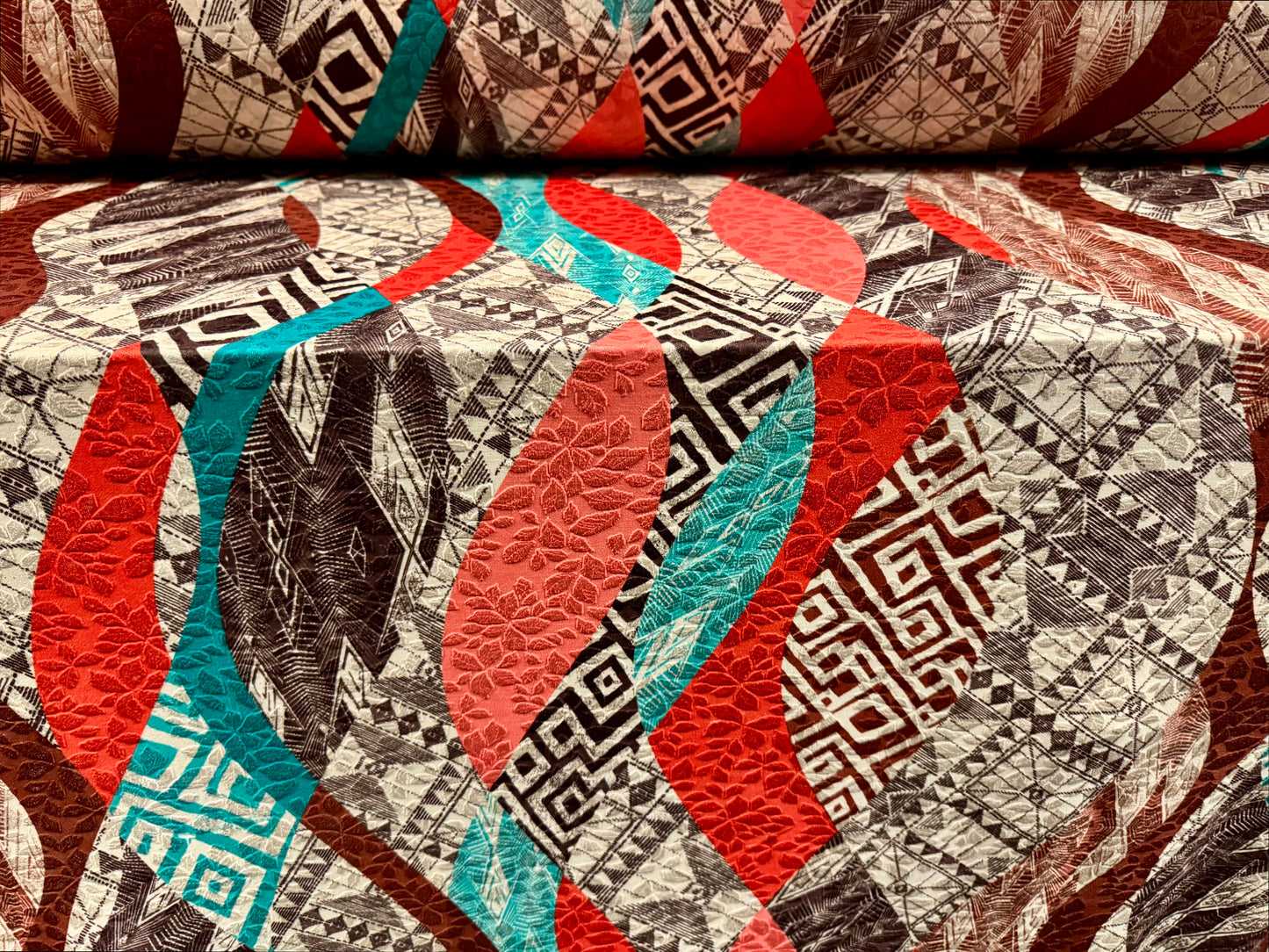 Stretch spandex jersey jacquard fabric, per metre - geometric swirl print - nude orange brown & turquoise